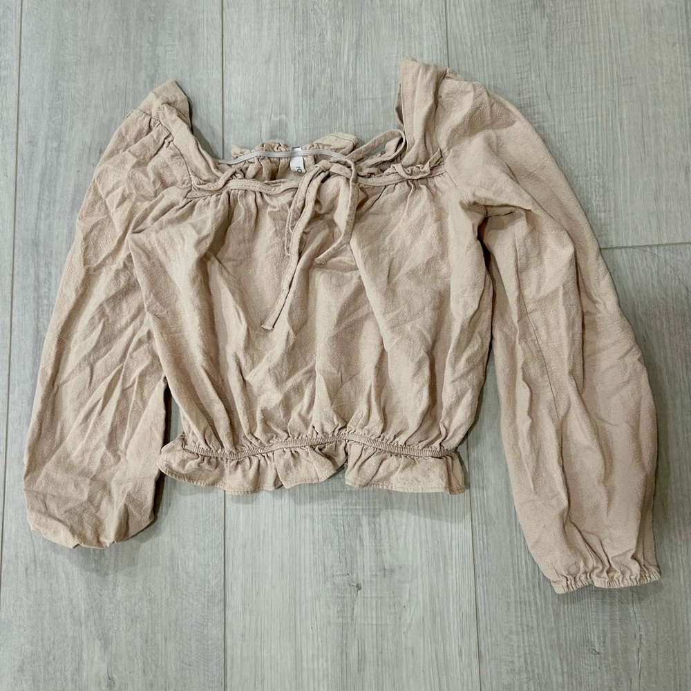 Cream off the shoulder blouse with tie detail